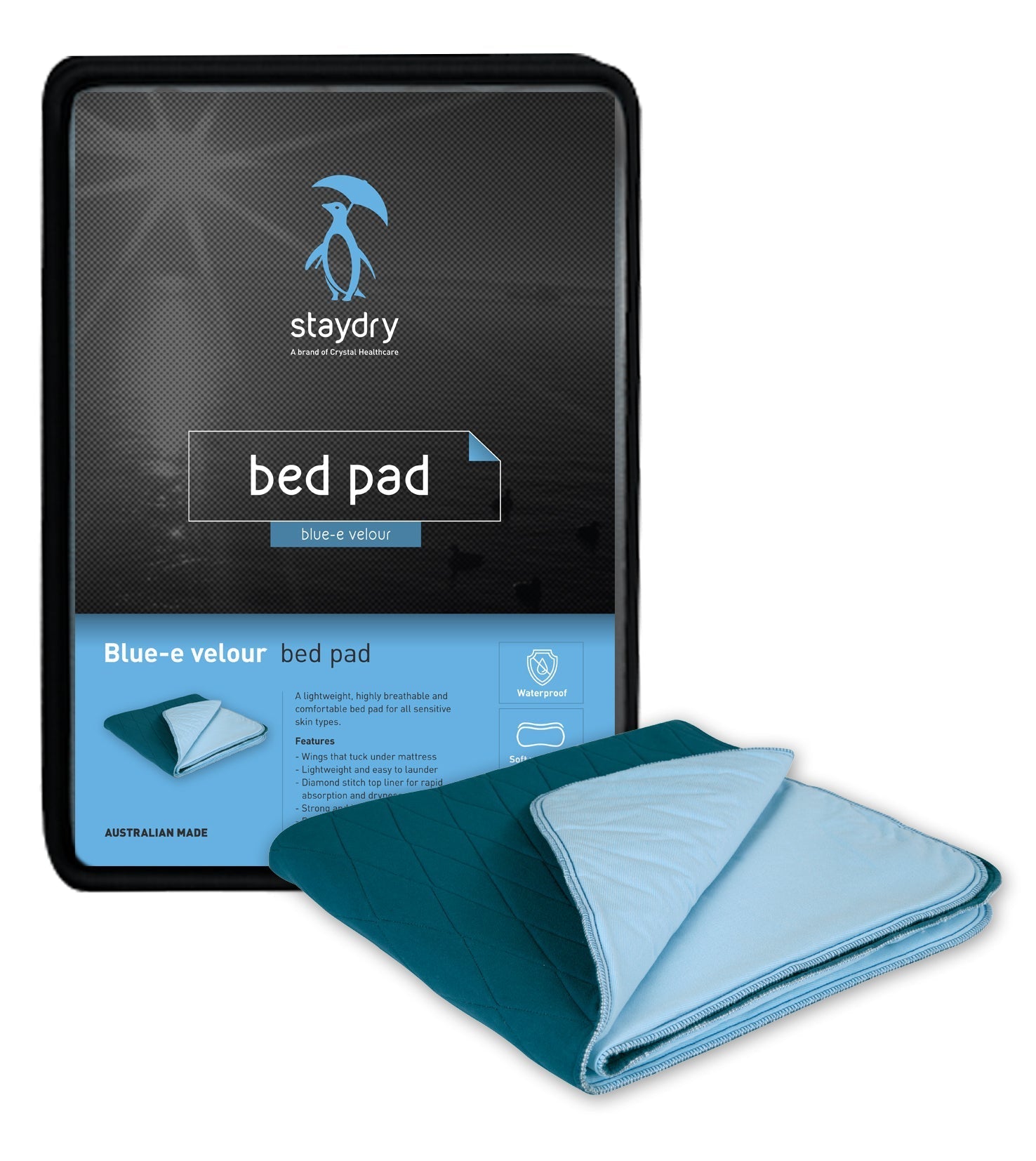 Teal colour bed pad sitting next to its packaging