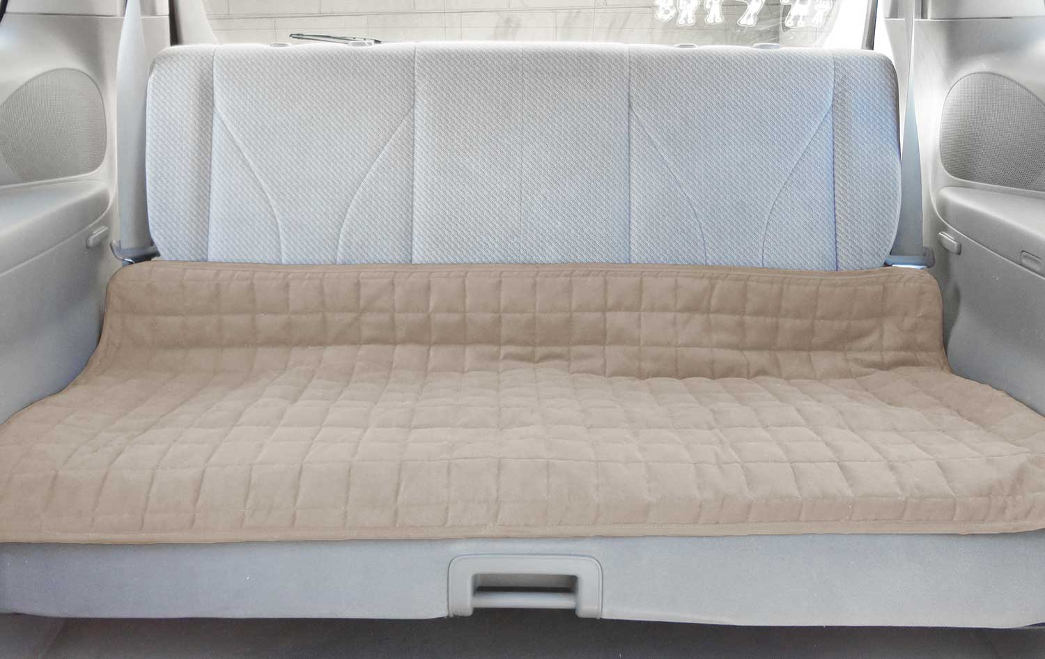 Beige Seat Protector Waterproof Large on the car seat